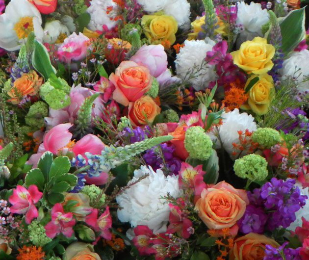 Colorful mixed bouquet of roses and flowers
