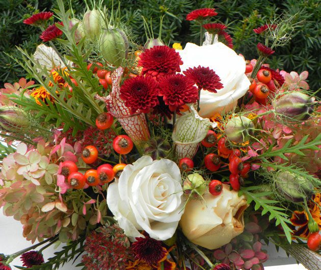 White roses and red chrysanthemums bouquet