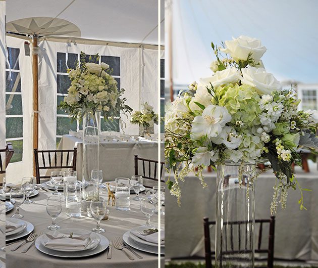 Wedding table with tall white floral centerpiece