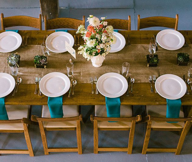 Rustic wedding table with floral centerpiece