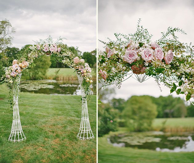 Outdoor floral wedding arch with pink roses