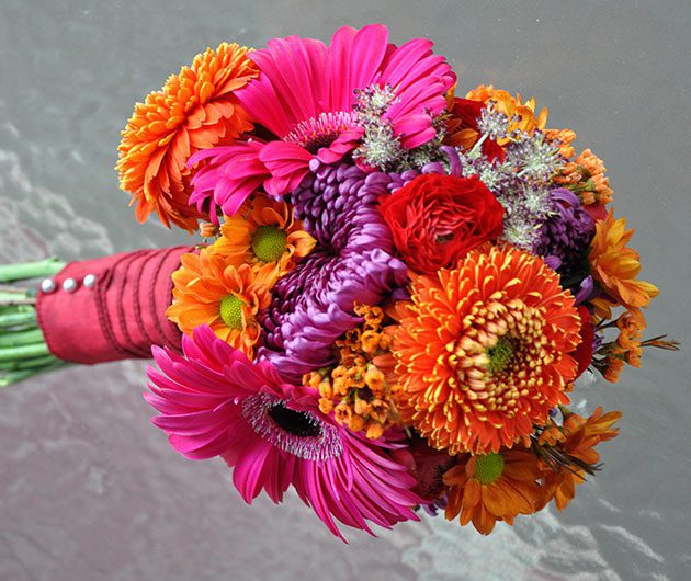 Vibrant pink and orange mixed flower bouquet