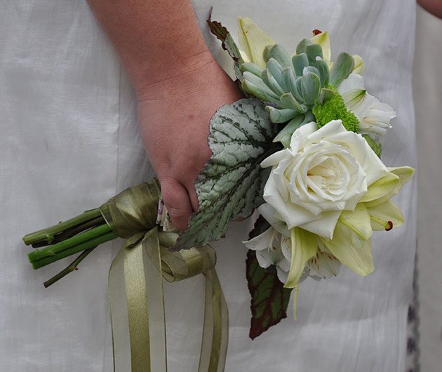Bridal bouquet with white roses and succulent
