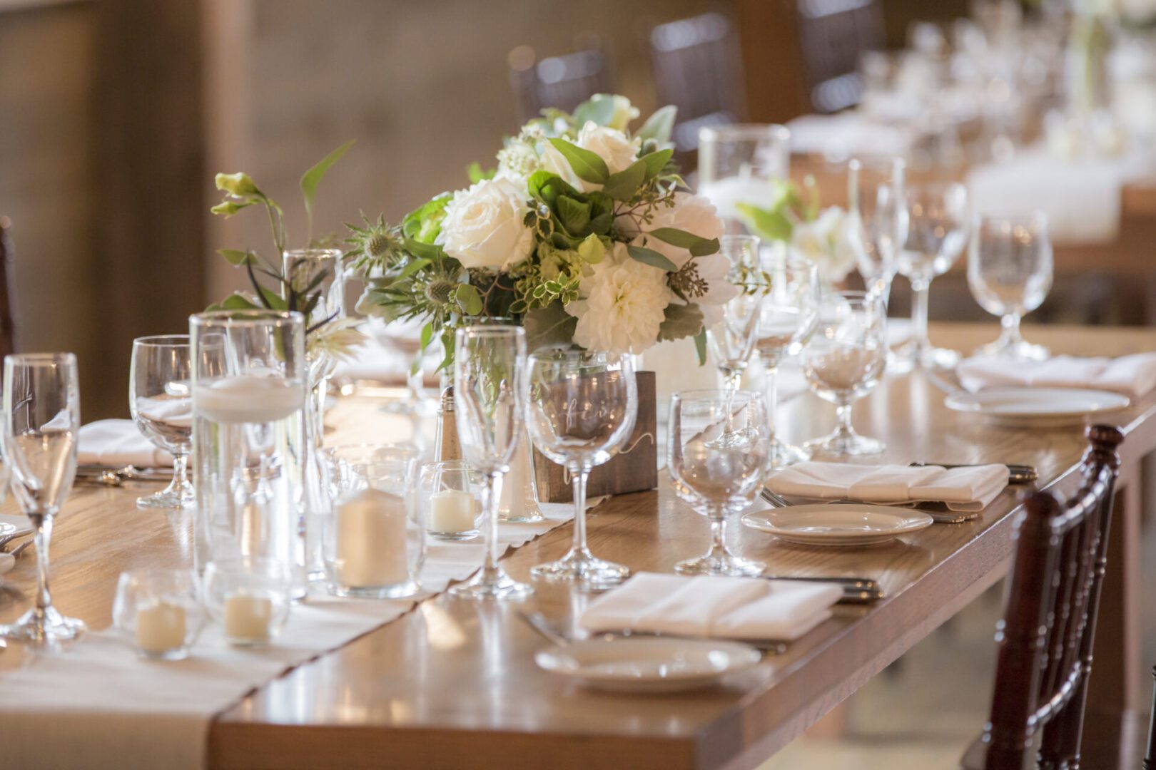 Elegant wedding table with white floral centerpiece