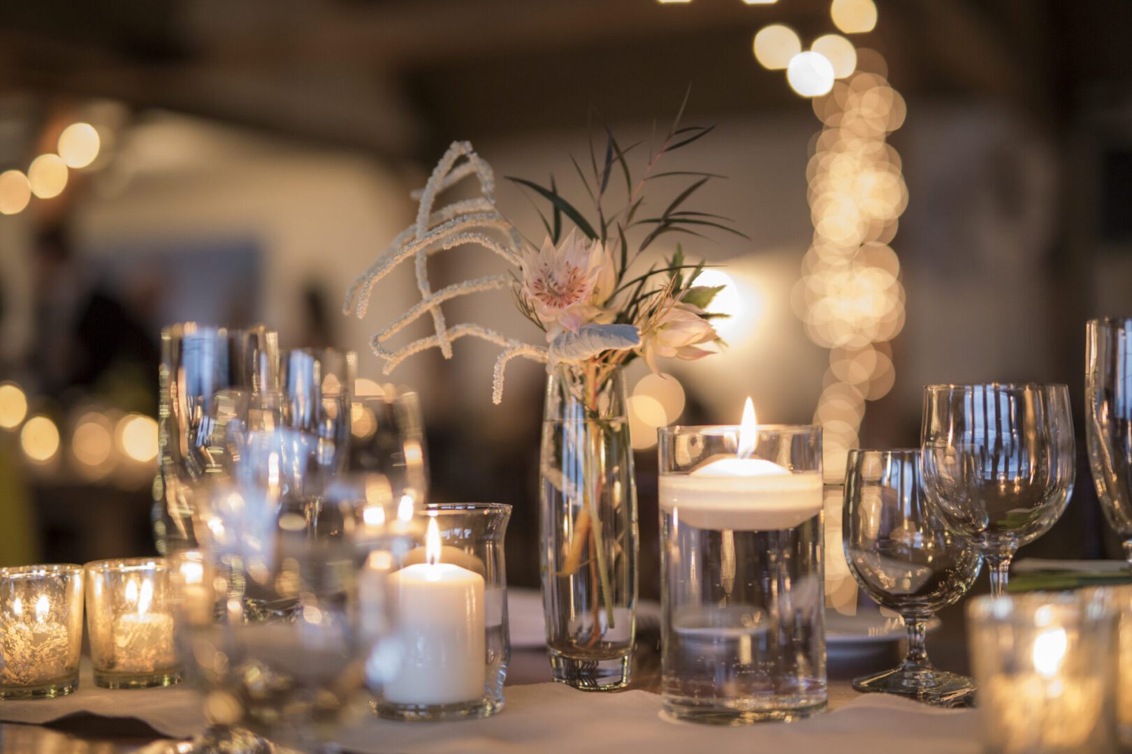 Elegant candlelit table with floral centerpiece